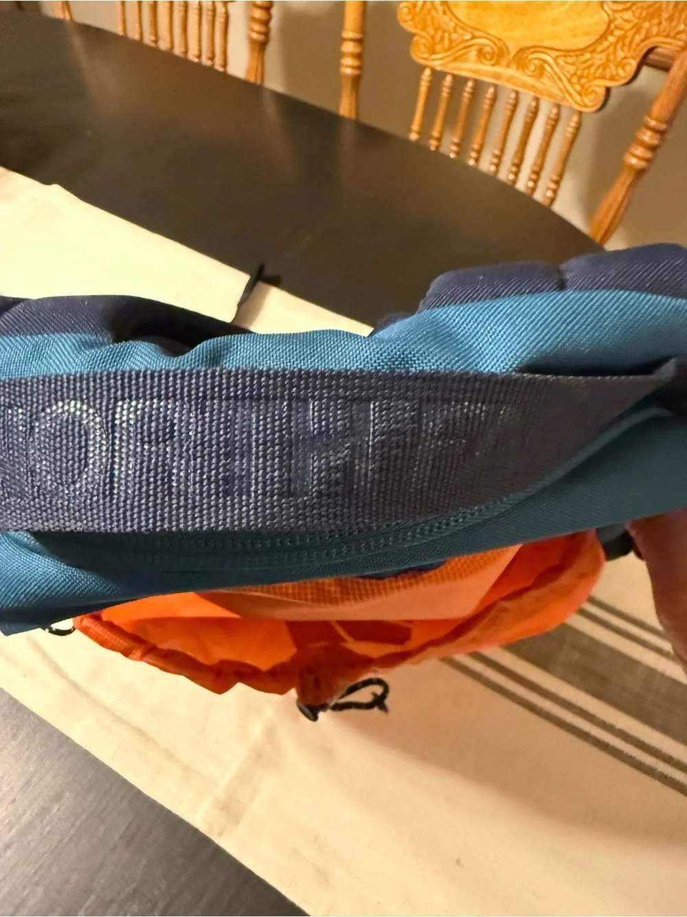 The North Face  Bozer backpack, retro orange, navy, dark teal